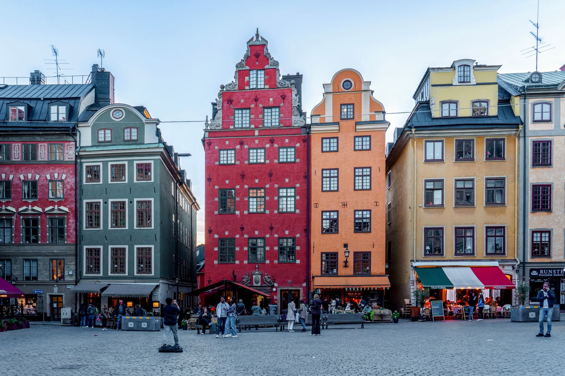 The iconic 17th-century terracotta and yellow merchant houses lining Stortorget square in Stockholm's Old Town