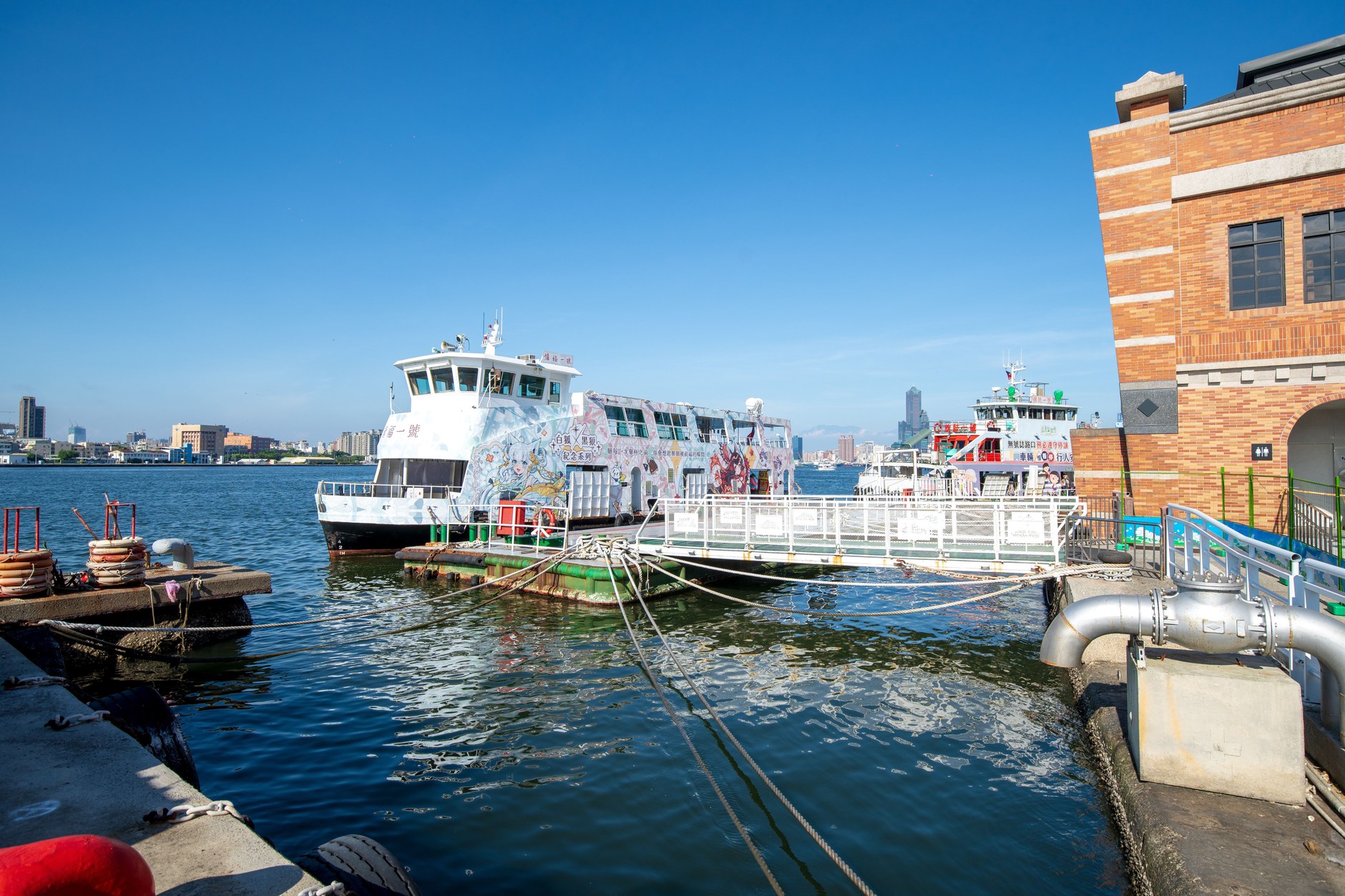 Public art sculptures and repurposed industrial warehouses at Pier-2 Art Center in Kaohsiung