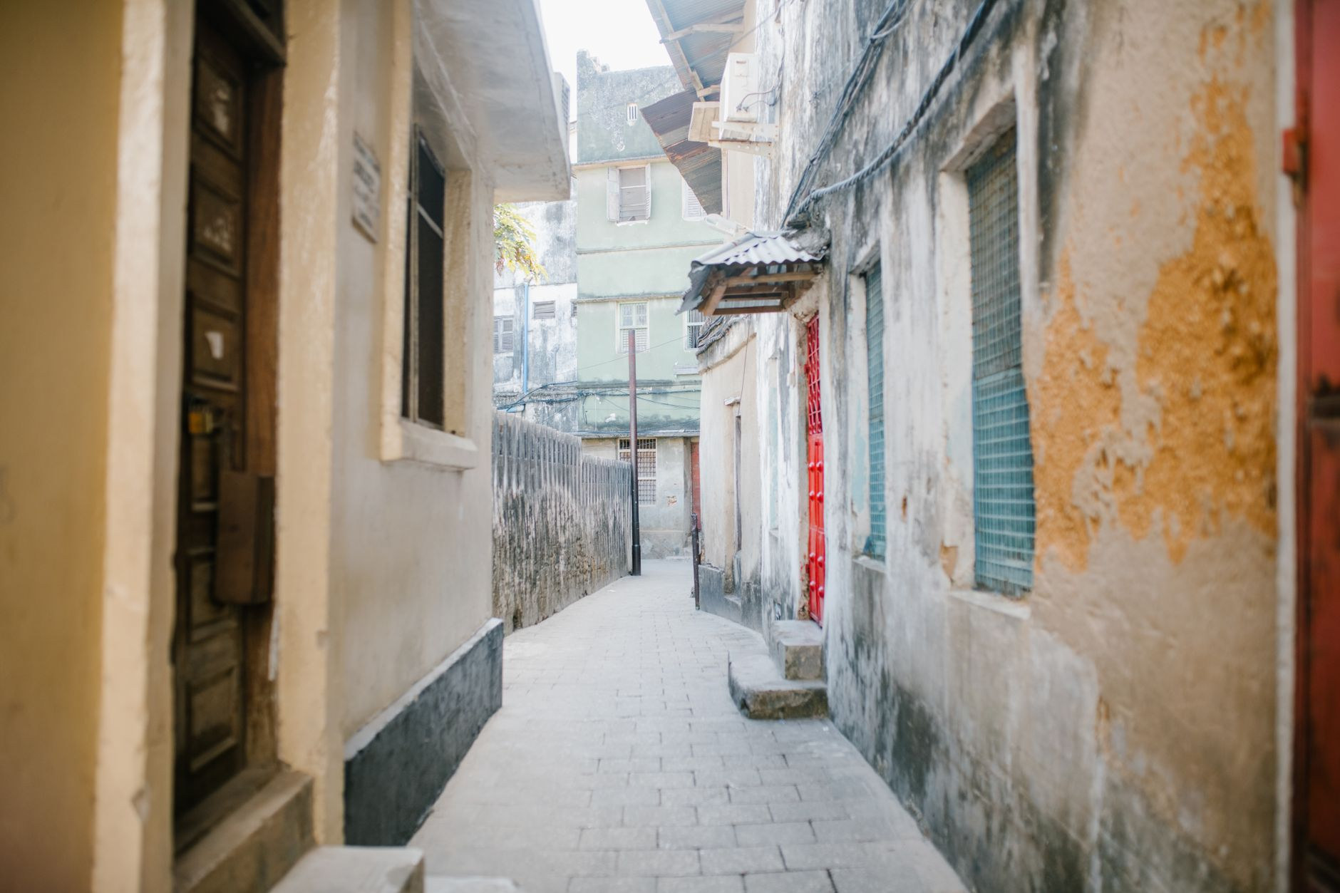 Historic carved wooden doors and coral-rag stone alleys of Stone Town