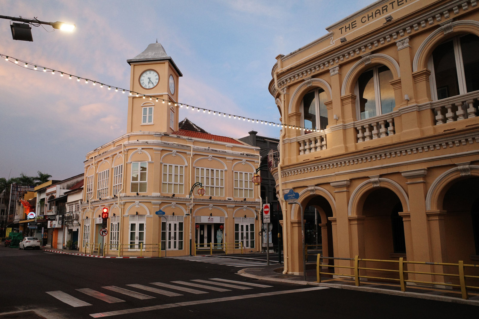 Historic shophouses and clock tower in Phuket Old Town