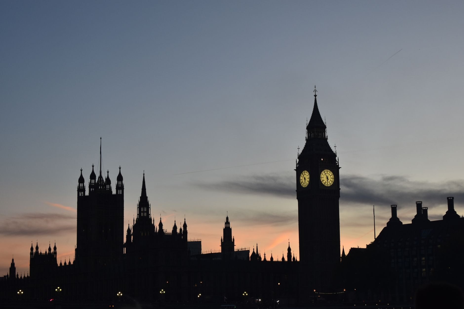 Elizabeth Tower Big Ben and the Palace of Westminster illuminated across the Thames