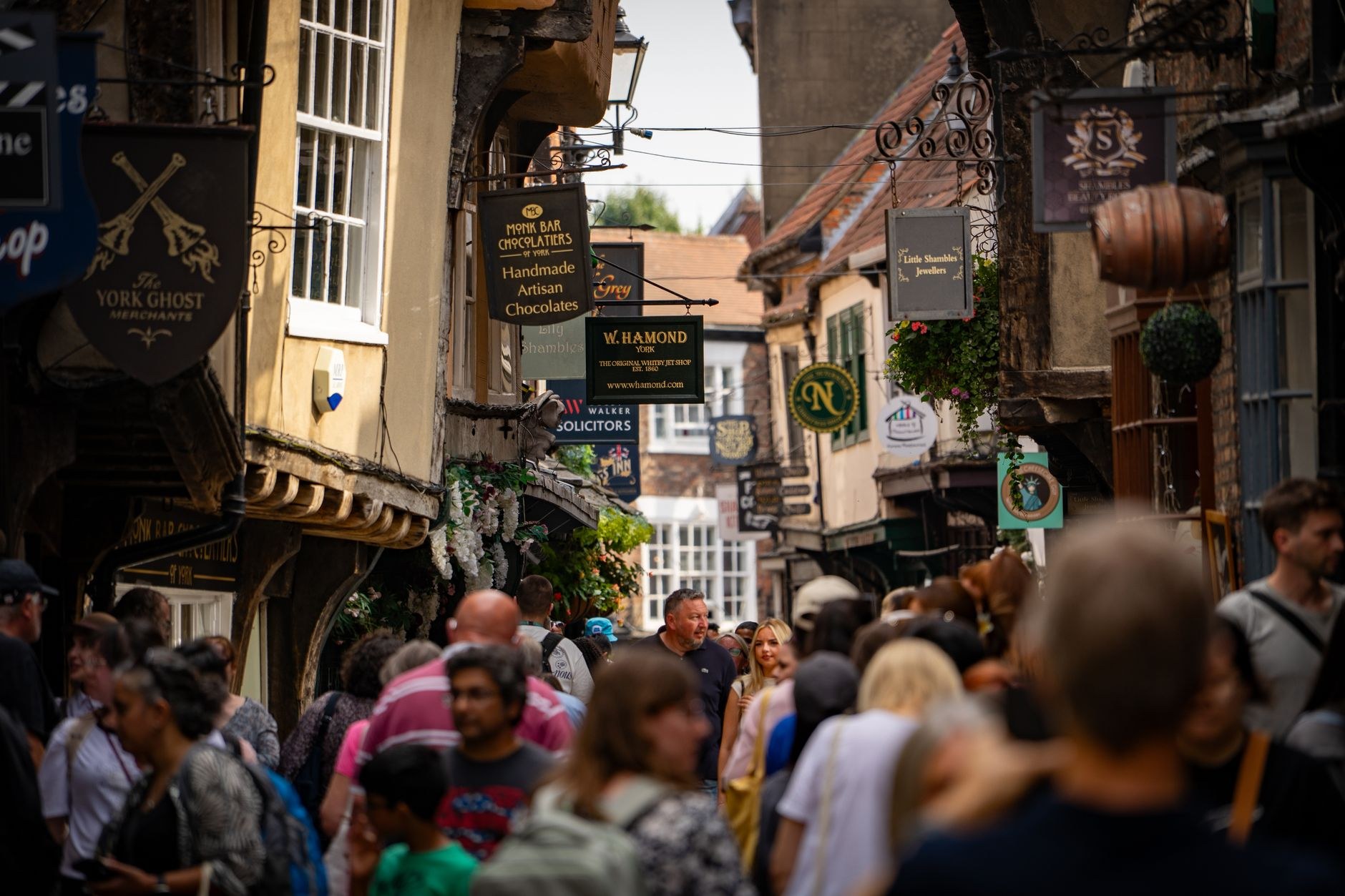 Overhanging medieval timber-framed buildings along The Shambles in York
