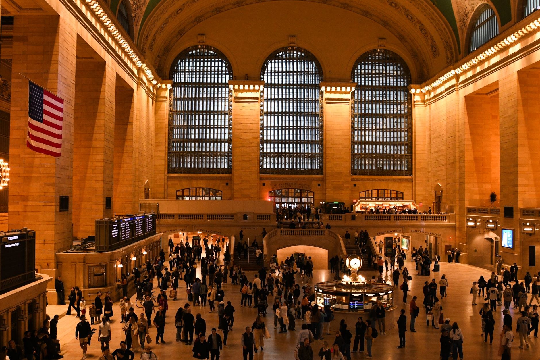 Bustling main concourse of Grand Central Terminal under celestial ceiling