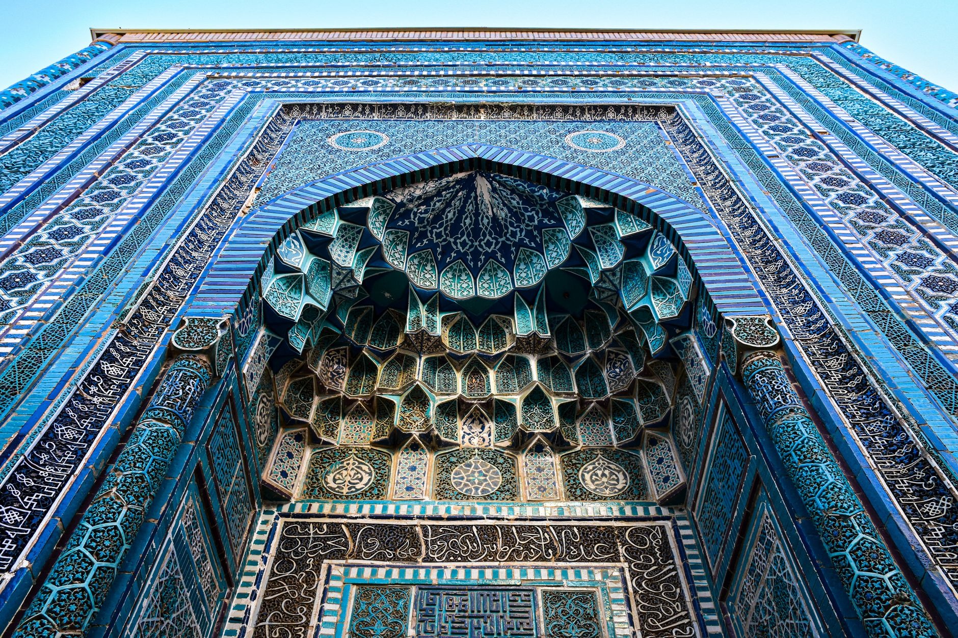Breathtaking avenue of cobalt blue and turquoise mosaic tiled mausoleums in the Shah-i-Zinda necropolis of Samarkand