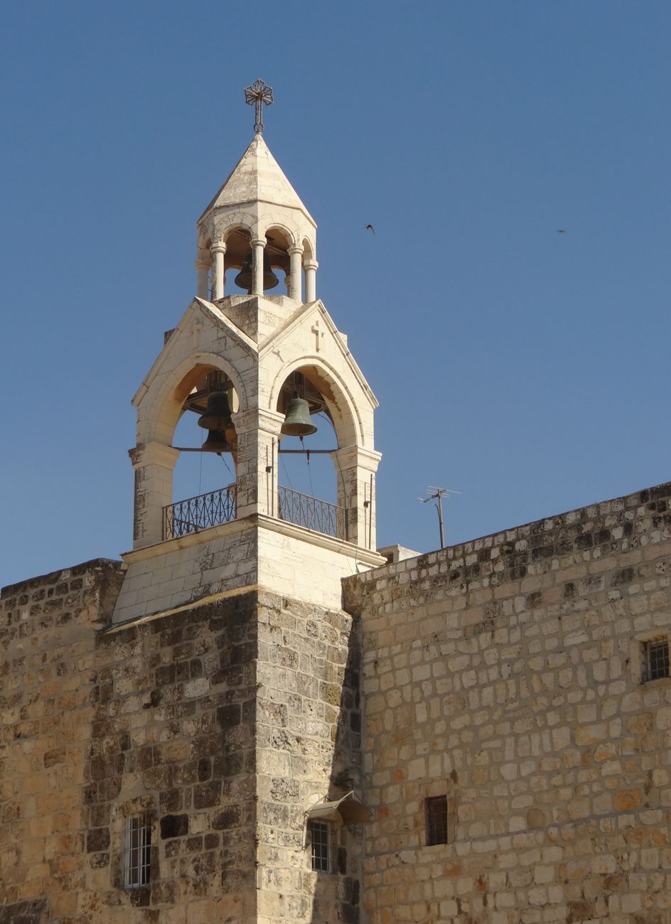 Bell tower and stone facade of the fourth-century Church of the Nativity in Bethlehem
