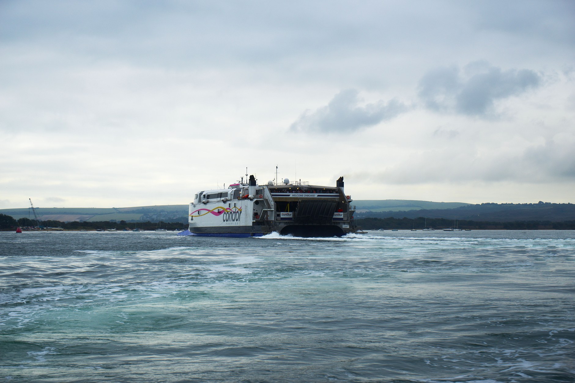 Passenger and vehicle ferry crossing the blue waters of the Apolima Strait between Upolu and Savai'i