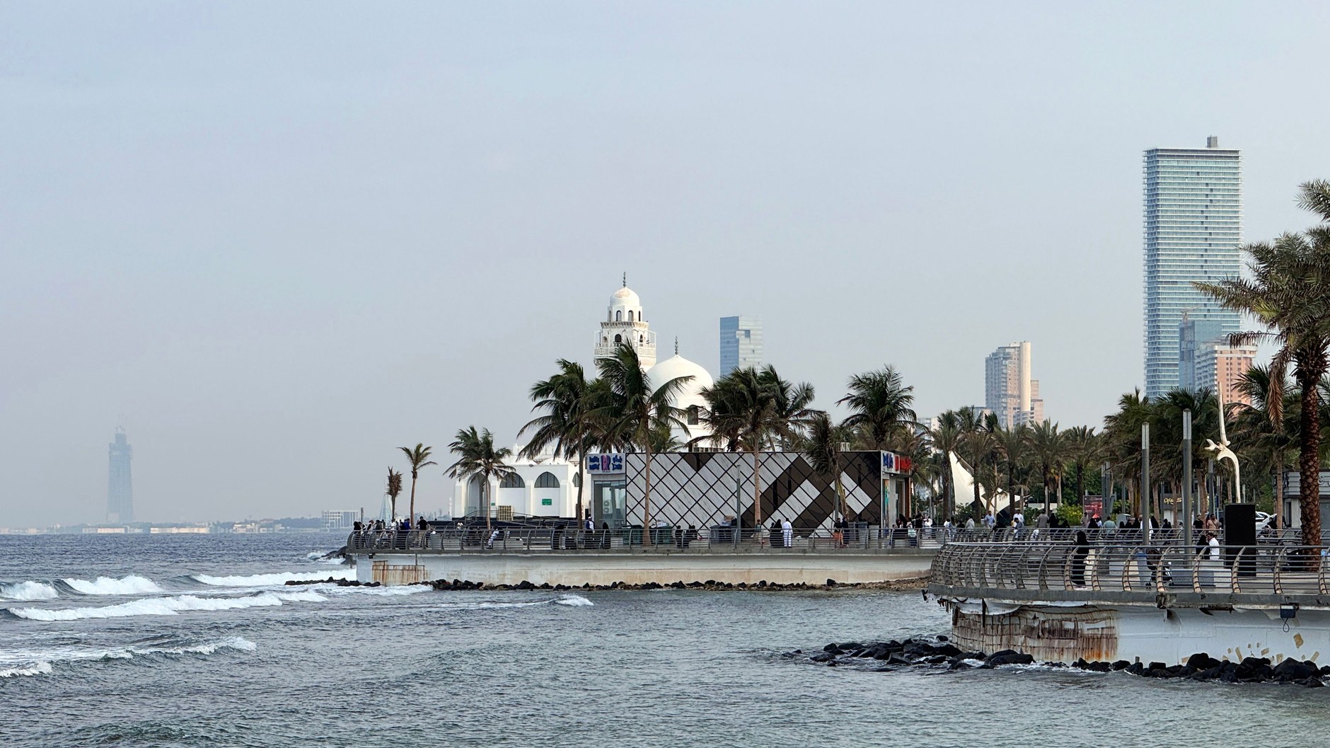 Broad sandy expanse and coastal promenade of Lumley Beach in western Freetown