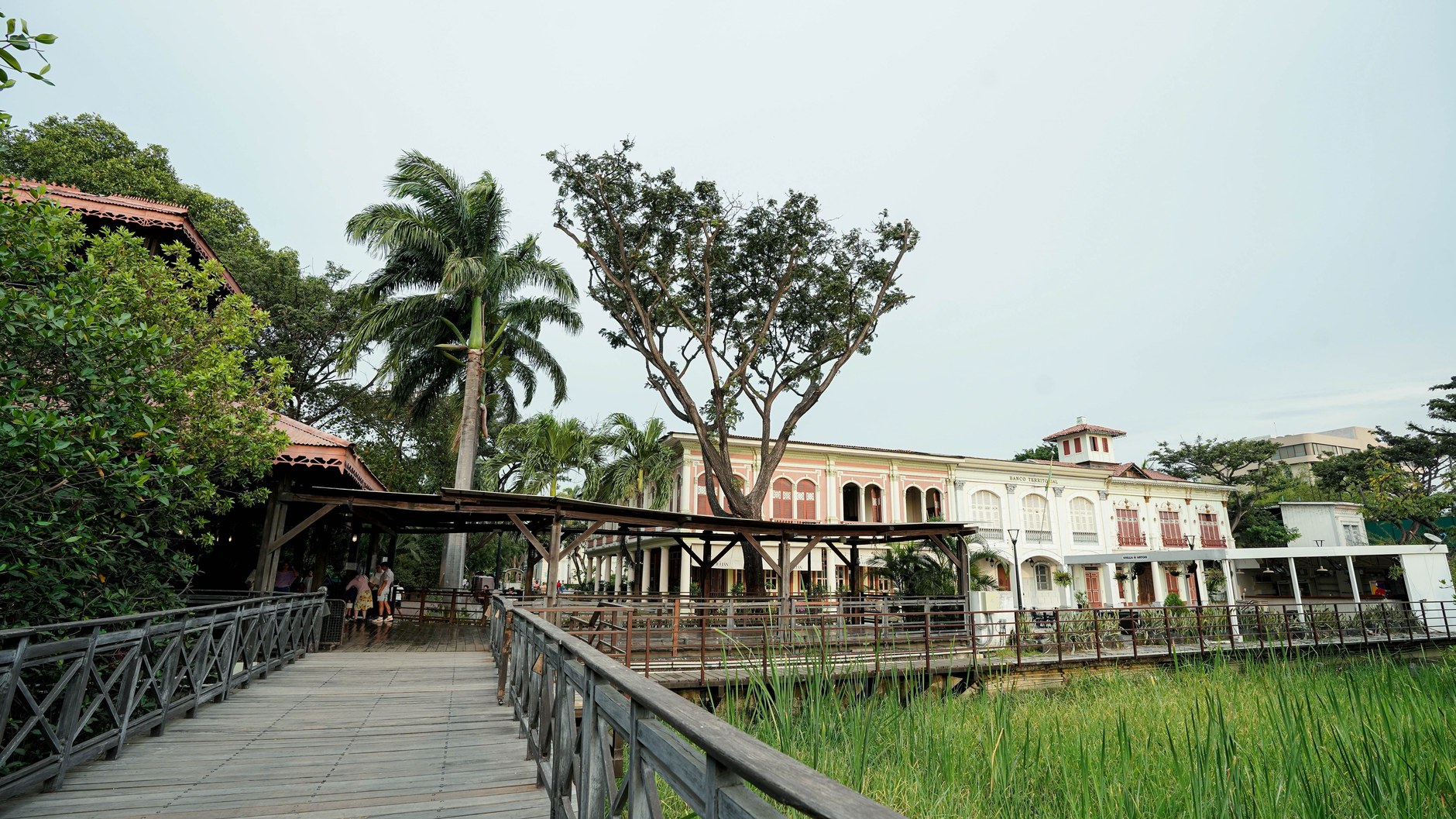 Historic white wooden Dutch colonial buildings along the Waterkant in Paramaribo