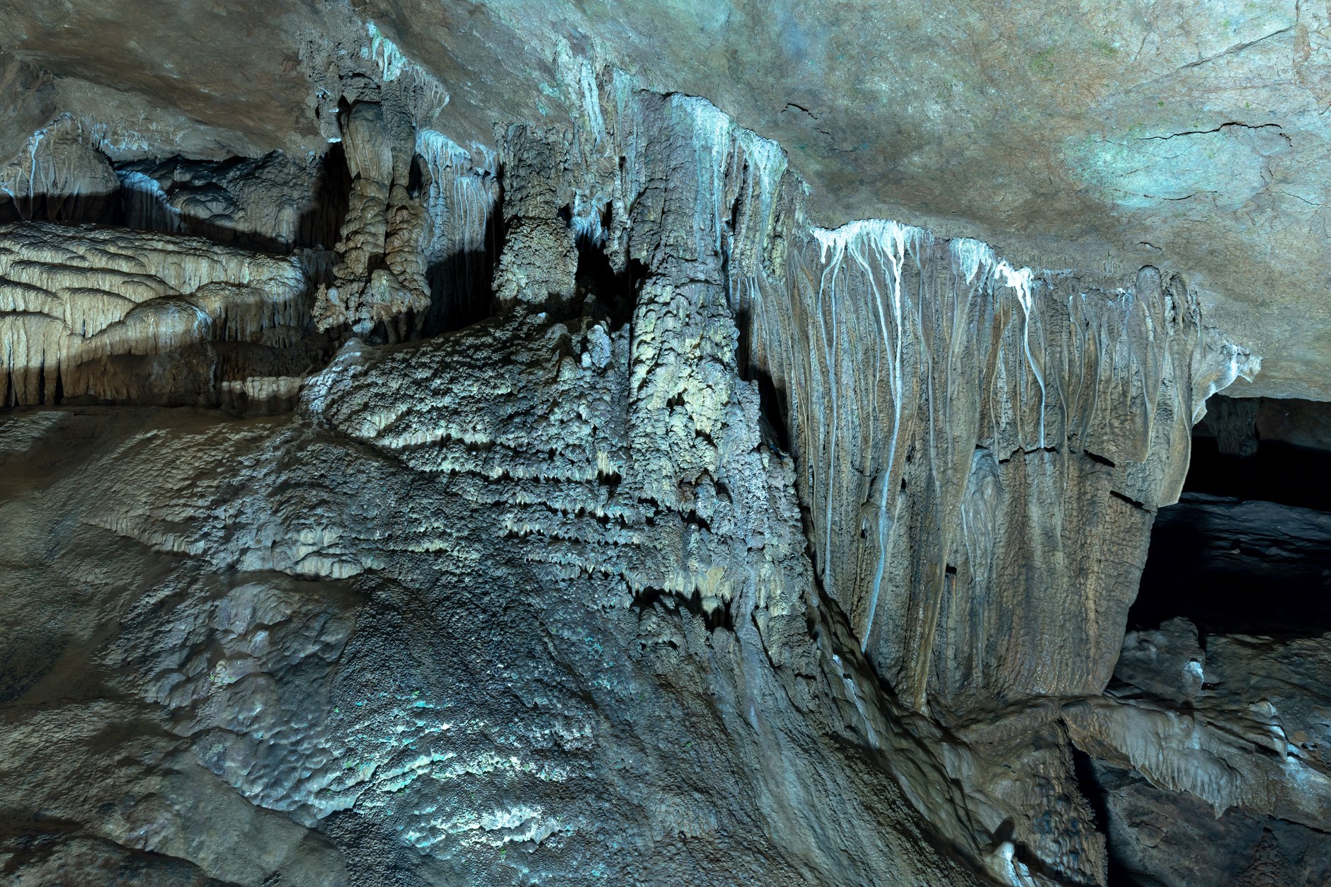 Extensive subterranean limestone cavern formations and stalactites inside Conch Bar Caves