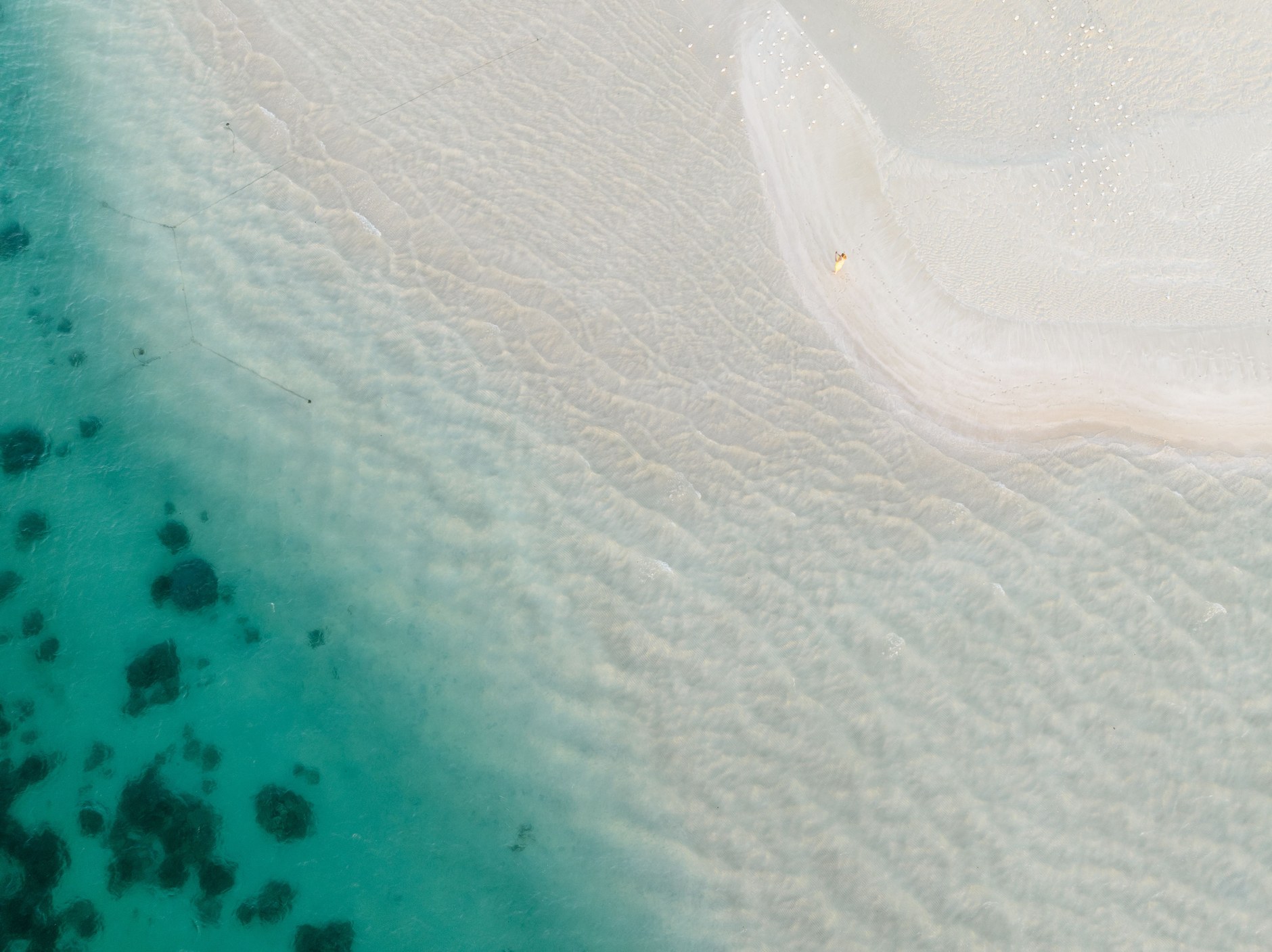 Powdery white sand and crystal clear turquoise water along Grace Bay on Providenciales