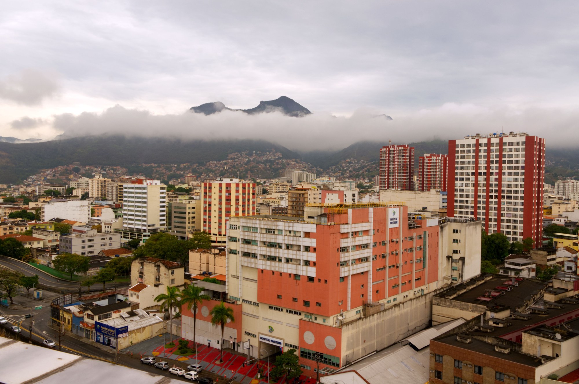 Aerial view of Caracas urban skyline with green peaks of Mount Ávila rising behind