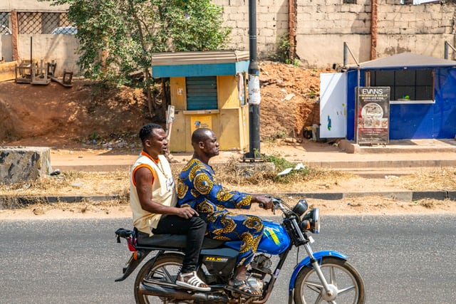 Traveller using a phone while visiting Sudan.