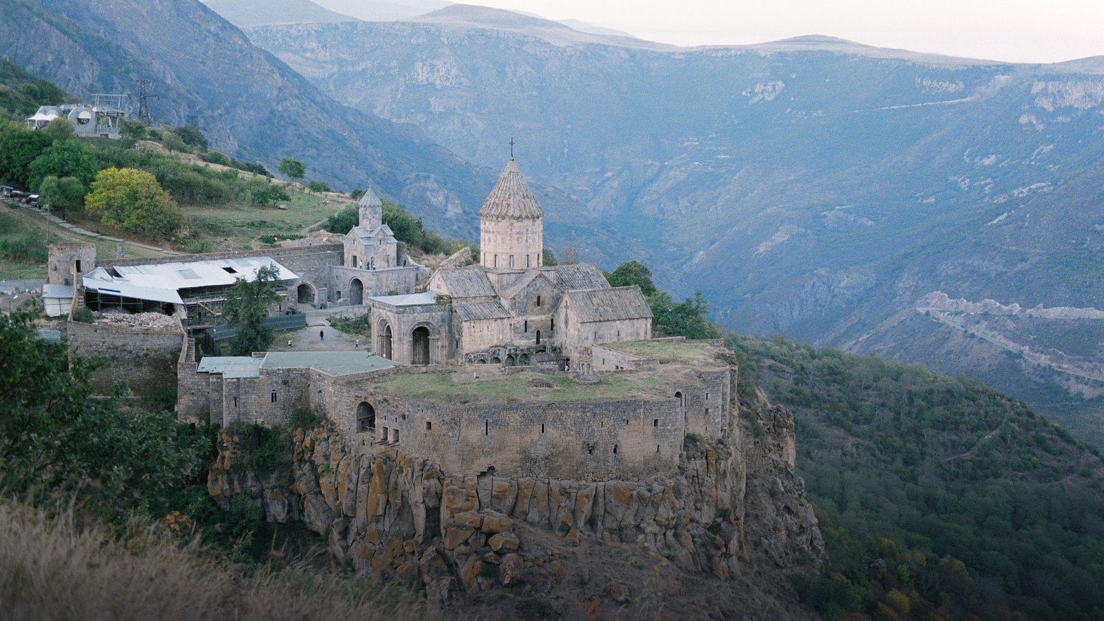 Medieval stone monastic complex of Tatev situated on the edge of a deep basalt cliff above the Vorotan Gorge
