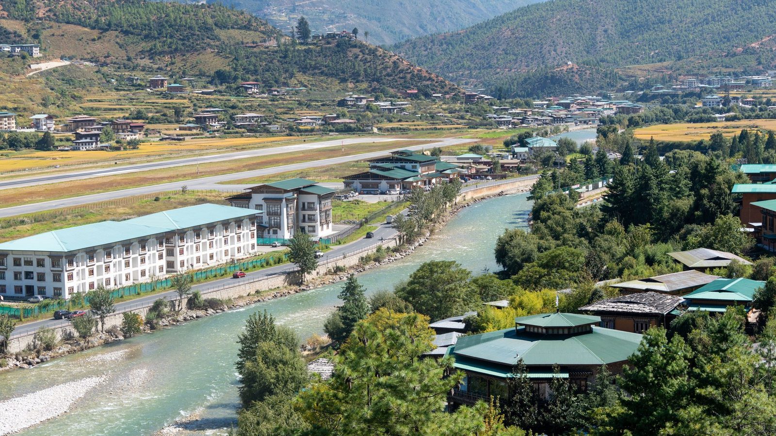 Scenic travel view of traditional fortress dzong architecture in Paro Valley, Bhutan
