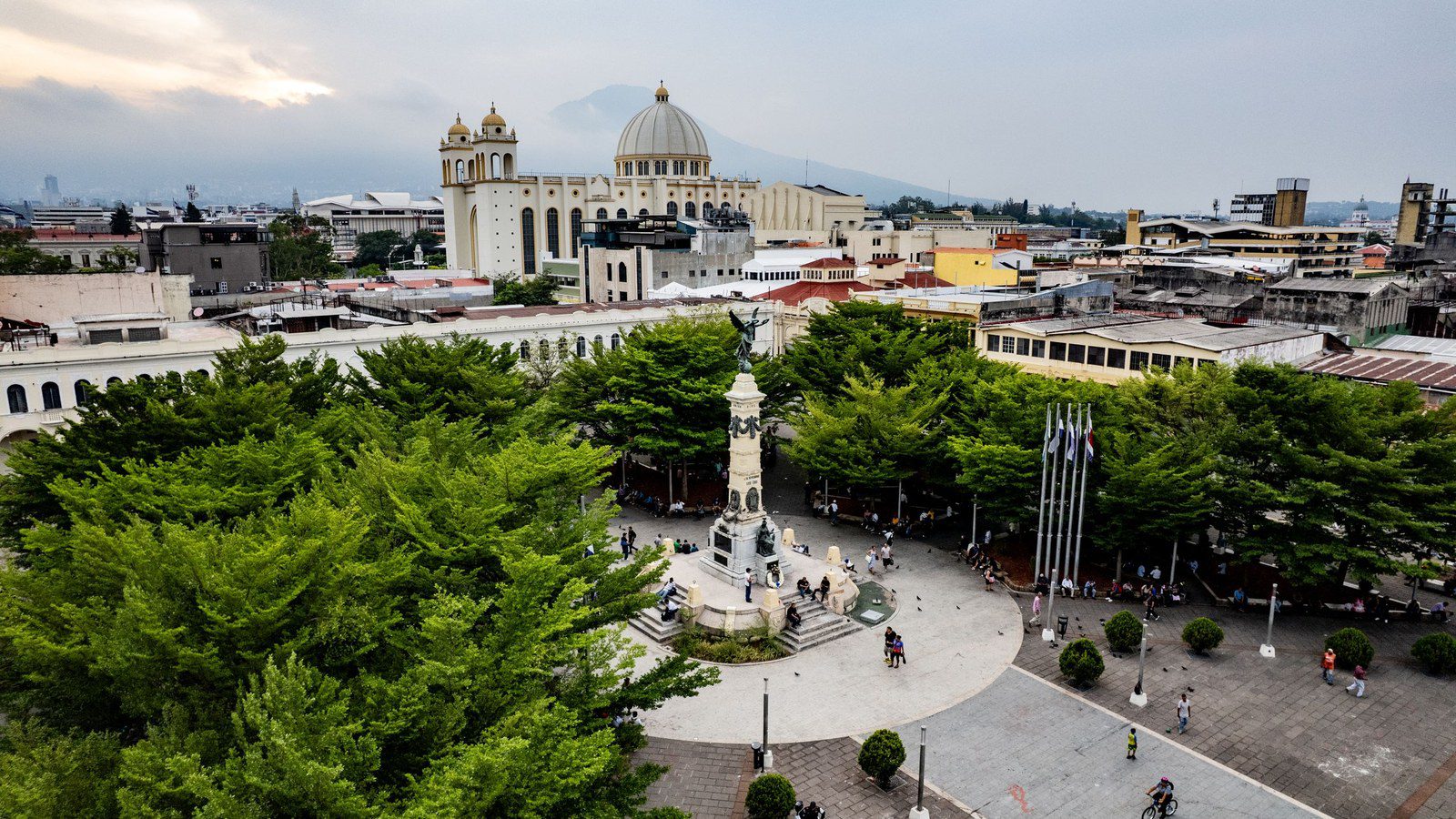 Aerial view over Plaza Libertad with the Liberty Monument and the Metropolitan Cathedral of San Salvador in El Salvador