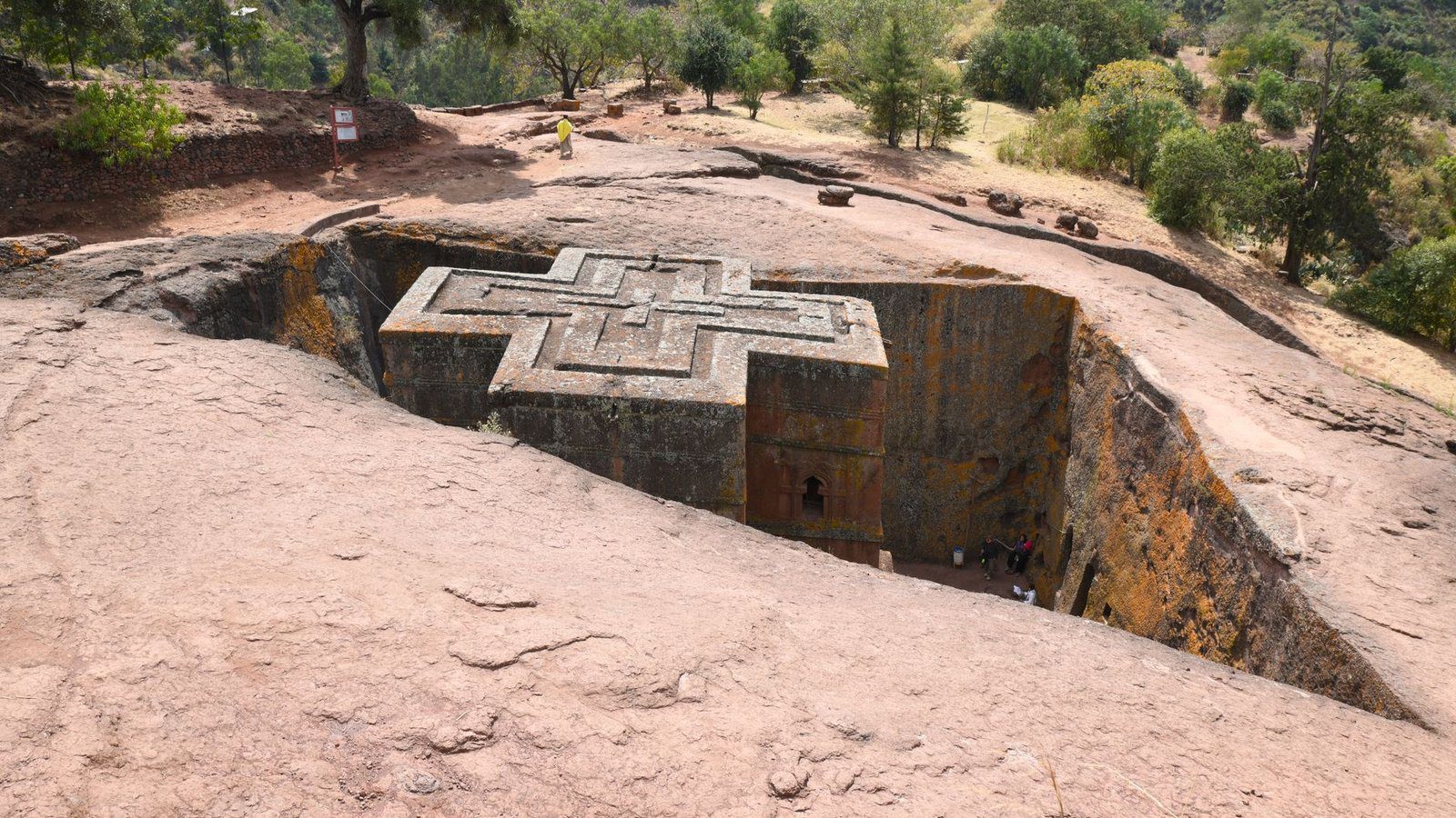 High angle aerial perspective of the rock-hewn monolithic Church of Saint George carved from volcanic tuff in Lalibela, Ethiopia