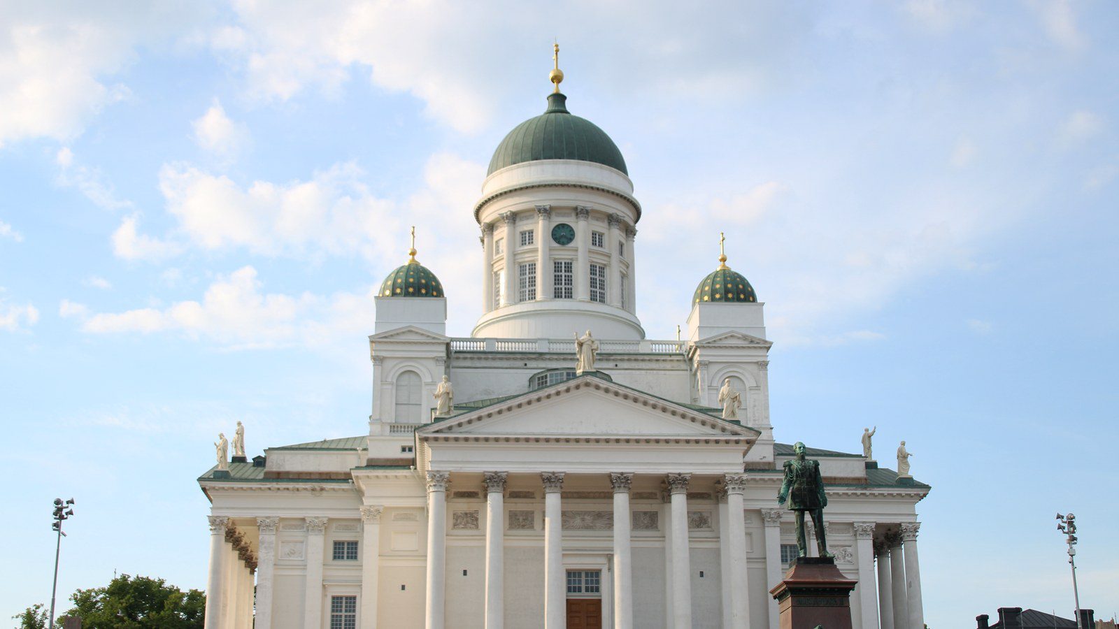 Stunning view of Helsinki Cathedral with a clear blue sky, highlighting its elegant architecture.