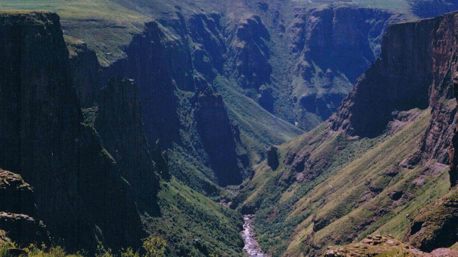 Spectacular single-drop plunge waterfall of Maletsunyane Falls cascading into a deep basalt gorge in the highlands of Lesotho