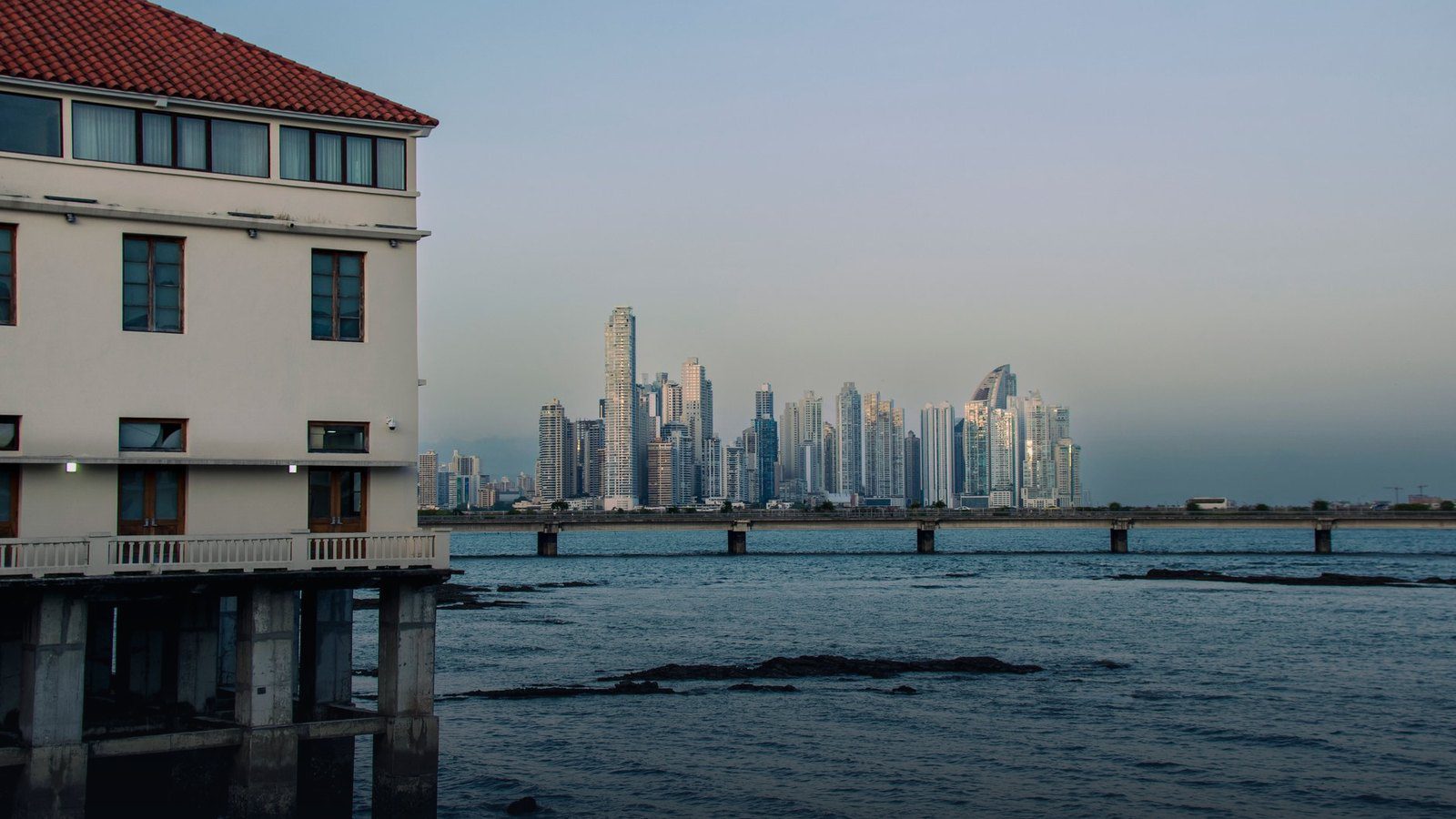 Modern high-rise skyscrapers of the Panama City skyline stretching along the Pacific Ocean coastline