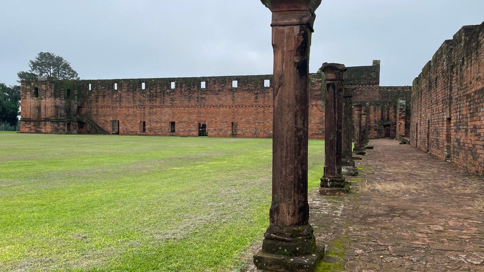 Scenic travel view of historic stone ruins at the Jesuit Mission of Jesús de Tavarangue, Paraguay
