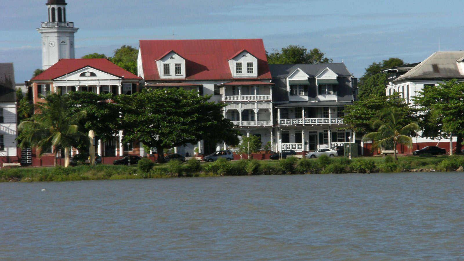Scenic travel view of colonial riverside promenade along the Waterkant in Paramaribo, Suriname