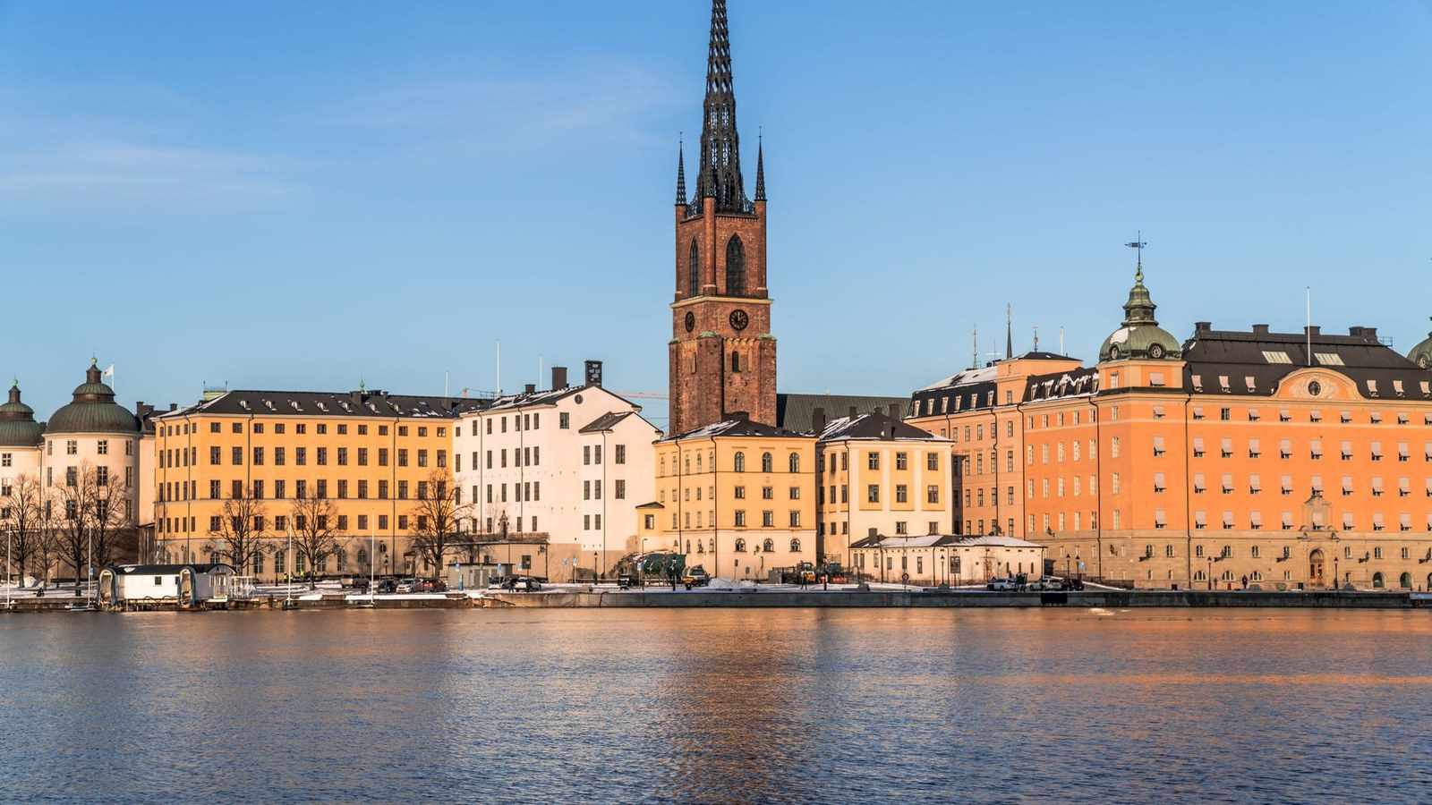 Explore the historic waterfront of Stockholm with its stunning architecture and serene waterscape.