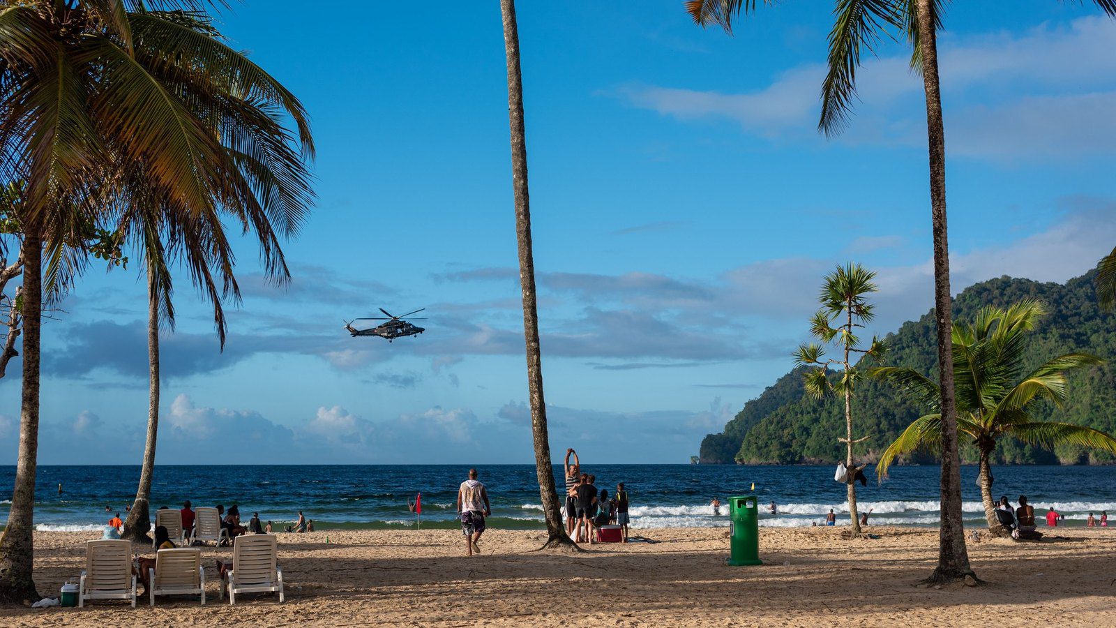 Scenic travel view of golden crescent shores at Maracas Beach, Trinidad
